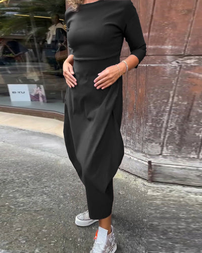 Elegante abito monocromatico con tasche