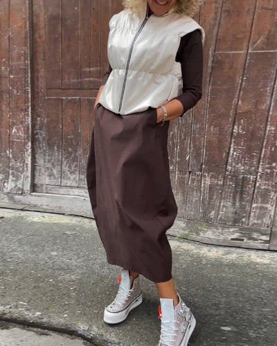Elegante abito monocromatico con tasche