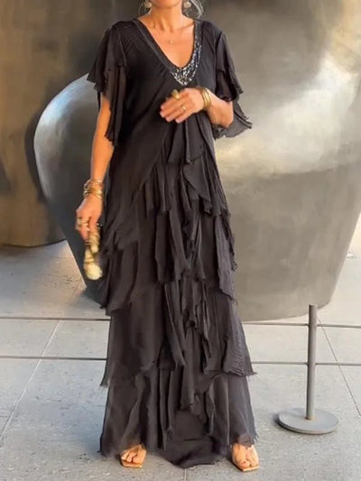 Elegante abito lungo con volant