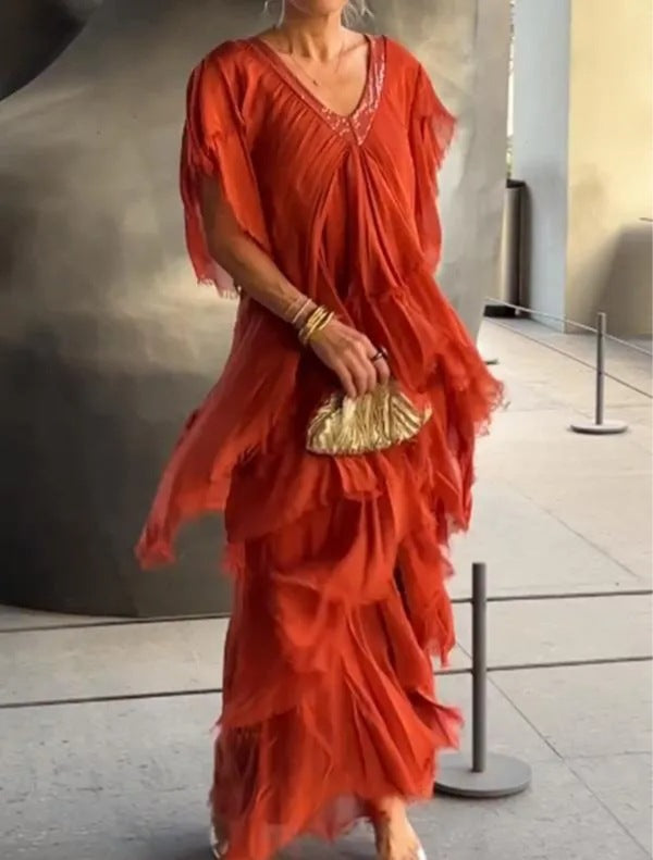 Elegante abito lungo con volant