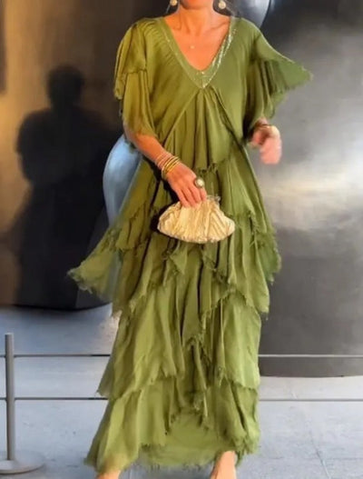 Elegante abito lungo con volant