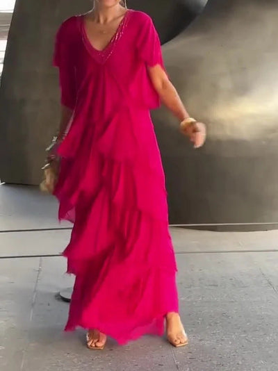Elegante abito lungo con volant