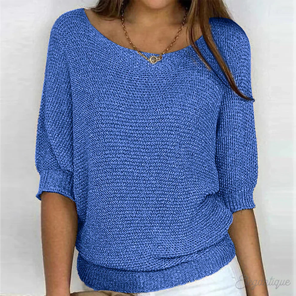 Elegante maglione lavorato a maglia a trecce