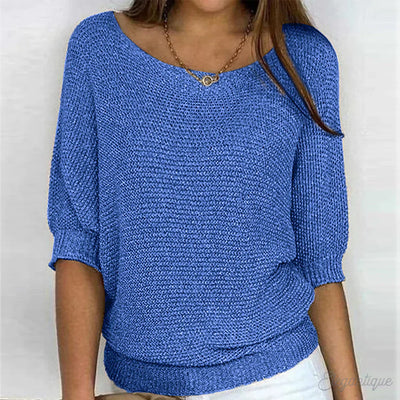 Elegante maglione lavorato a maglia a trecce