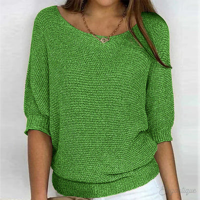 Elegante maglione lavorato a maglia a trecce