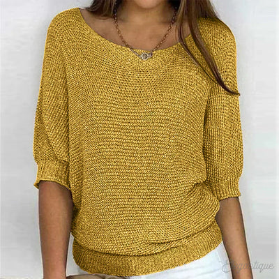 Elegante maglione lavorato a maglia a trecce